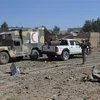 Hiện trường một vụ đánh bom xe tại Afghanistan. (Ảnh: AFP/TTXVN)