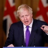 Thủ tướng Anh Boris Johnson tại cuộc họp báo ở London, Anh. (Ảnh: AFP/TTXVN)