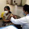 Tiêm vaccine ngừa COVId-19 tại New Delhi, Ấn Độ. (Ảnh: THX/TTXVN)