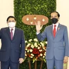 Thủ tướng Phạm Minh Chính và Tổng thống Indonesia Joko Widodo. (Ảnh: Dương Giang/TTXVN)