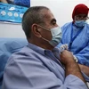 Tiêm vaccine ngừa COVID-19 cho người dân tại Algiers, Algeria. (Ảnh: THX/TTXVN)