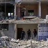 Nhà cửa bị tàn phá sau loạt không kích của Israel xuống Dải Gaza ngày 14/5/2021. (Ảnh minh họa. AFP/TTXVN)