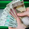 Đồng ruble của Nga lao dốc hơn 20% so với USD trong tuần qua