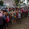 Mexico giải cứu gần 77.500 người di cư khỏi băng nhóm buôn người