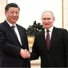 Lãnh đạo Trung Quốc-Nga đánh giá cao vai trò quan hệ song phương