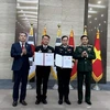 Bộ trưởng Bộ Quốc phòng Phan Văn Giang và Bộ trưởng Bộ Quốc phòng Hàn Quốc Lee Jong-sup chứng kiến Hải quân hai nước trao văn bản Điều khoản tham chiếu Tham vấn Hải quân Việt Nam-Hàn Quốc. (Ảnh: Khánh Vân, Đức Hưng/TTXVN)