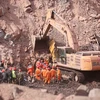 Lực lượng cứu hộ làm nhiệm vụ tại hiện trường một vụ sập mỏ than Trung Quốc. (Ảnh: THX/TTXVN)