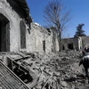Hiện trường đổ nát sau một vụ không kích tại Syria. (Ảnh minh họa.. AFP/TTXVN)