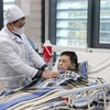 Bệnh nhân ngộ độc khí CO điều trị tại Bệnh viện đa khoa tỉnh Lạng Sơn. (Ảnh: Văn Đạt/TTXVN)