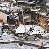 Những ngôi nhà bị sập trong động đất tại Suzu, tỉnh Ishikawa, Nhật Bản ngày 1/1/2024. (Ảnh: Kyodo/TTXVN)