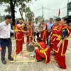 Phần thi giã bánh giày nằm trong khuôn khổ các hoạt động chào mừng Lễ hội Vua Hùng dạy dân cấy lúa. (Nguồn: Báo Phú Thọ)