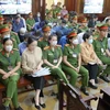 Các bị cáo tại phiên tòa (ngày 13/3). (Ảnh: Thanh Vũ/TTXVN)