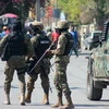 Cảnh sát Haiti tăng cường an ninh tại Port-au-Prince. (Ảnh: AFP/TTXVN)