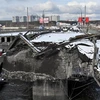 Một cây cầu bị phá hủy trong xung đột tại thành phố Irpin, Ukraine, ngày 8/3/2022. (Ảnh: AFP/TTXVN)