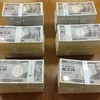 Đồng tiền mệnh giá 10.000 yen tại thành phố Yokosuka, quận Kanagawa (Nhật Bản). (Ảnh: AFP/TTXVN)