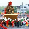 Xe mô hình Chiến thắng Điện Biên Phủ diễu hành tại Lễ kỷ niệm 70 năm Chiến thắng Điện Biên Phủ. (Ảnh: Lâm Khánh/TTXVN)