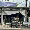 Hiện trường đám cháy của hai gian hàng trước Nhà văn hoá khu phố 1, phường Tam Hoà, thành phố Biên Hòa. (Ảnh: Lê Xuân/TTXVN)