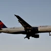 11 người nhập viện do nhiễu động không khí trên chuyến bay của hãng Delta năm 2023. (Ảnh: AFP/TTXVN)