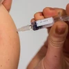 Tiêm vaccine phòng sởi và rubella cho người dân tại Berlin, Đức. (Ảnh: AFP/TTXVN)