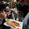 Lễ hội bánh mỳ Việt Nam lần thứ 2 năm 2024 diễn ra tại Công viên Lê Văn Tám, Quận 1, Thành phố Hồ Chí Minh. (Ảnh: Hồng Đạt/TTXVN)