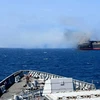 Con tàu bị lực lượng Houthi tấn công trên Vịnh Aden, ngày 6/3/2024. (Ảnh: AFP/TTXVN)