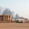Khói bốc lên trong giao tranh tại Sudan. (Ảnh minh họa. AFP/TTXVN)