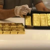 Vàng miếng được bày bán tại một cửa hàng ở Dubai, Các tiểu vương quốc Arab thống nhất (UAE). (Ảnh: AFP/TTXVN)