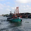 Tàu cá của ngư dân huyện Châu Thành (Kiên Giang) xuất hành ra khơi. (Ảnh: Lê Huy Hải/TTXVN)