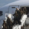 Lực lượng an ninh Kenya đến Port-au-Prince, Haiti. (Ảnh: Reuters)