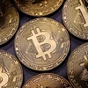 Đồng tiền kỹ thuật số bitcoin. (Ảnh: Getty Images/TTXVN)