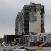 Tòa nhà bị hư hại do xung đột tại Mariupol, Ukraine, ngày 22/4/2022. (Ảnh: THX/ TTXVN)