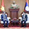 Chủ tịch nước Tô Lâm hội kiến Chủ tịch Quốc hội Lào Saysomphone Phomvihane. (Ảnh: Nhan Sáng/TTXVN)
