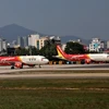 Trong ảnh: Máy bay của Hãng hàng không Vietjet tại sân bay Đà Nẵng. (Ảnh: Ngọc Hà/TTXVN)