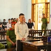 Bị cáo Đinh Tiến Bình bị tuyên phạt 10 năm tù giam về tội “Vi phạm quy định về tham gia giao thông đường bộ”. (Ảnh: Quang Thái/TTXVN)