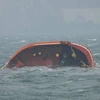Tàu MT Terra Nova treo cờ Philippines đã bị lật úp. (Ảnh: AFP)
