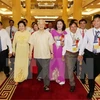 Tổng Bí thư Nguyễn Phú Trọng với các đại biểu nông dân xuất sắc. (Ảnh: Trí Dũng/TTXVN)