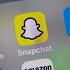 Biểu tượng Snapchat trên màn hình điện thoại. (Ảnh: AFP/ TTXVN)