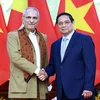 Thủ tướng Phạm Minh Chính và Tổng thống Timor-Leste Jose Ramos-Horta. (Ảnh: Dương Giang/TTXVN)