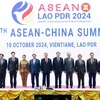 Thủ tướng Phạm Minh Chính cùng Trưởng đoàn các nước ASEAN và Thủ tướng Trung Quốc Lý Cường chụp ảnh chung. (Ảnh: Dương Giang/TXVN)