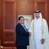 Thủ tướng Phạm Minh Chính hội kiến Chủ tịch Quốc hội Qatar Hassan bin Abdullah Al-Ghanim. (Ảnh: Dương Giang/TTXVN)