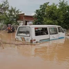 Cảnh ngập lụt sau những trận mưa lớn tại quận Gatumba thuộc Bujumbura, Burundi, ngày 19/4/2024. (Ảnh: AFP/TTXVN)