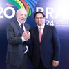 Thủ tướng Phạm Minh Chính và Tổng thống Brazil Luiz Inácio Lula da Silva. (Ảnh: Dương Giang/TTXVN)