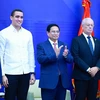 Thủ tướng Phạm Minh Chính với lãnh đạo Học viện Ngoại giao Dominicana. (Ảnh: Dương Giang/TTXVN)