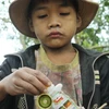 [Photo] Nguy cơ tiềm ẩn cho sức khỏe trẻ nhỏ từ thuốc bảo vệ thực vật