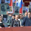 [Photo] Tổng thống Nga Putin tuần hành tưởng nhớ Trung đoàn Bất tử