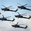 Đội máy bay nhào lộn đang điều khiển những chiếc trực thăng Mi-28 trong cuộc thi Aviadarts-2015. (Nguồn: Sputniknews)