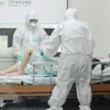Điều trị cho một bệnh nhân nhiễm MERS tại bệnh viện Konyang ở Daejeon, miền trung Hàn Quốc. (Nguồn: Yonhap/TTXVN)