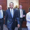 Tổng thống Mỹ Barack Obama (giữa, trước) tới thuyết phục các hạ nghị sĩ ủng hộ dự luật TPA trước phiên bỏ phiếu tại Hạ viện ở Washington, DC, ngày 12/6. (Nguồn: AFP/TTXVN) 