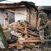 Một ngôi nhà lại làng Sartana, gần Mariupol, khu vực Donetsk, miền Đông Ukraine bị phá hủy trong xung đột ngày 17/8. (Nguồn: AFP/TTXVN) 