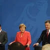 Lãnh đạo ba nước Đức, Pháp và Ukraine kêu gọi thực thi thoả Thuận hòa bình Minsk. (Nguồn: AFP/TTXVN)